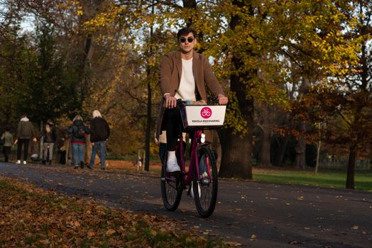 11/14/2020. Park Stromovka. Prague. Czech Republic. A man is riding his bike at the park on a winter da
