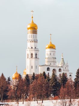 Ivan the Great Bell Tower, church tower inside the Moscow Kremlin complex. Winter day in Moscow, Russia.