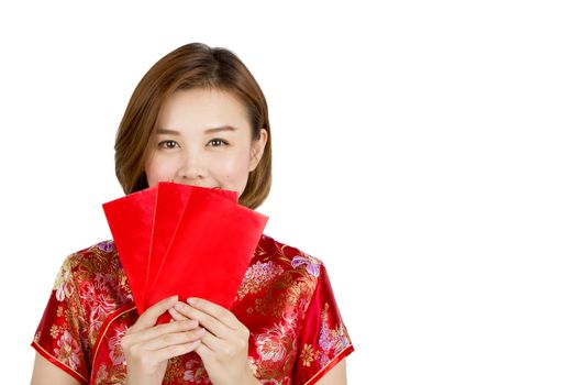 Asian girl got big surprise holding ung-pao or red pocket gift on isolated white background.