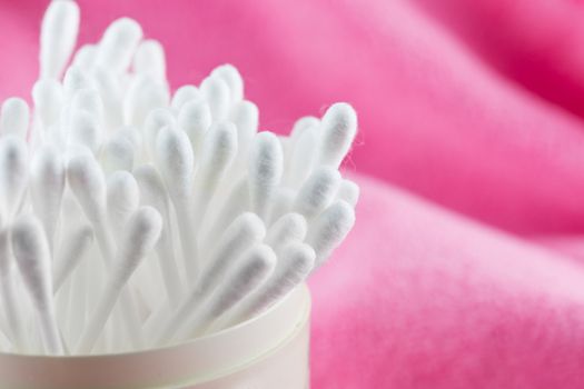 Close up of cotton Buds isolated on pink background : swab swab