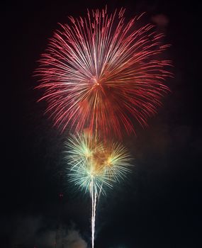 Beautiful colorful firework on the sky at night.