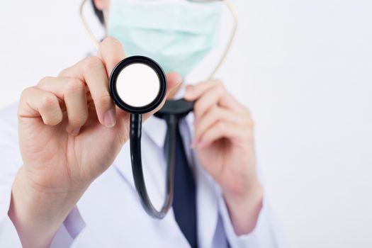 Doctor with a stethoscope in the hand touch monitor.