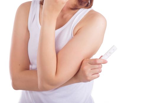 Young women shown pregnancy test concept isolated white background.