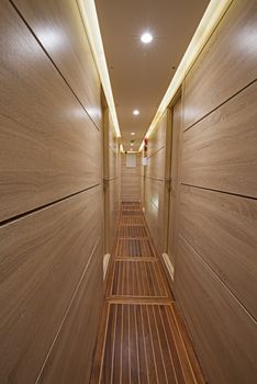 Interior design furnishing decor of corridor area in a large luxury motor yacht