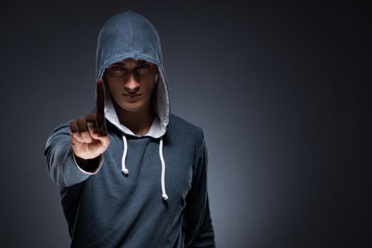 Innovation concept with young man pressing virtual buttons