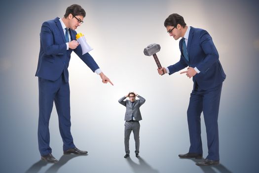 Bad angry boss shouting at employee with loudspeaker
