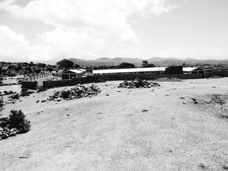 Tesseney, Eritrea - 10/11/2020: Beautiful photography of the landscape from the villages near the bord from Ethiopia. Old desert villages with some domestic animals.