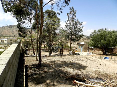 Tesseney, Eritrea - 10/11/2020: Beautiful photography of the landscape from the villages near the bord from Ethiopia. Old desert villages with some domestic animals.