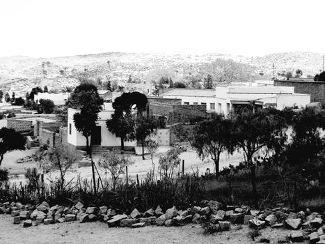 Tesseney, Eritrea - 10/11/2020: Beautiful photography of the landscape from the villages near the bord from Ethiopia. Old desert villages with some domestic animals.