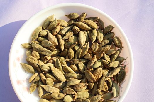 healthy and spicy Black Cardamom stock on bowl