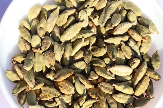 healthy and spicy Black Cardamom stock on bowl