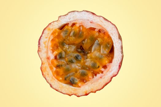 Maracuja cut in half and whole with leaf on yellow background. Passion fruit yellow with fruit juice and seeds
