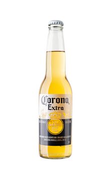 BAYONNE, FRANCE - CIRCA MARCH 2020: A bottle of Corona Extra beer isolated on white background.