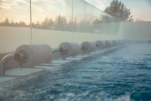 outdoor pool with water massage for relaxation and unwinding.