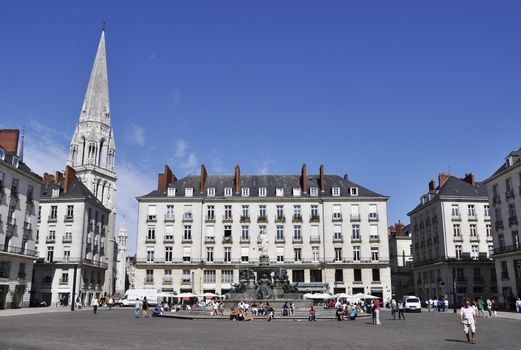 NANTES, FRANCE - CIRCA AUGUST 2011: Place Royale (royal square) in Nantes city centre. Saint Nicolas Basilica on the left side.