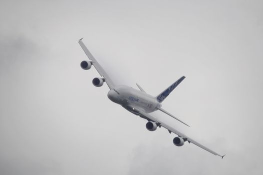 LONDON, UK, Saturday July 14, 2012. An Airbus A380 in a flight demonstration at Farnborough International Airshow 2012.