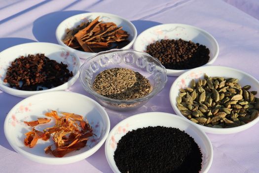 Collection of various healthy spices in the market