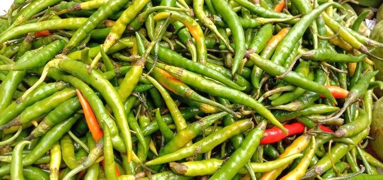 healthy and spicy and hot green chilli stock on bowl