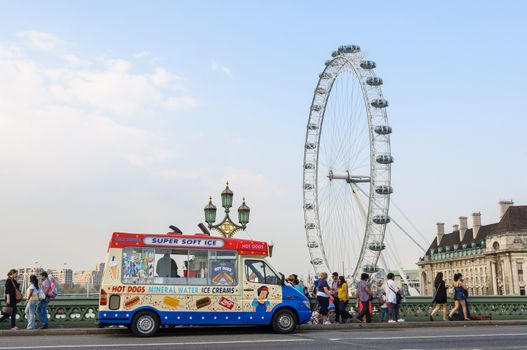 LONDON, UK - CIRCA APRIL 2011: Ice cream van on Westminster Bridge with the London Eye in the background.