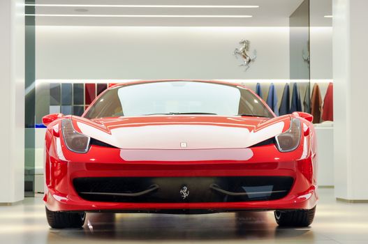Red Ferrari 458 Italia in showroom in London, UK