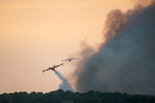 BAYONNE, FRANCE - 30 JULY, 2020: Two Canadair CL-415 from the French Securite Civile came from Marseille to help tackle the Chiberta forest fire in Anglet.