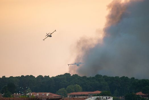 BAYONNE, FRANCE - 30 JULY, 2020: Two Canadair CL-415 from the French Securite Civile came from Marseille to help tackle the Chiberta forest fire in Anglet.