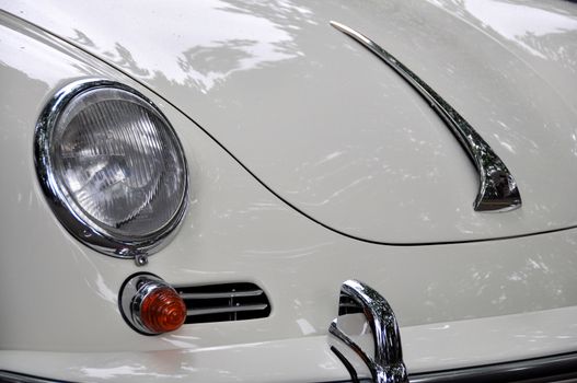 LONDON, UK - CIRCA SEPTEMBER 2011: Closeup shot of a white Porsche 356 C at Chelsea Autolegends car show.