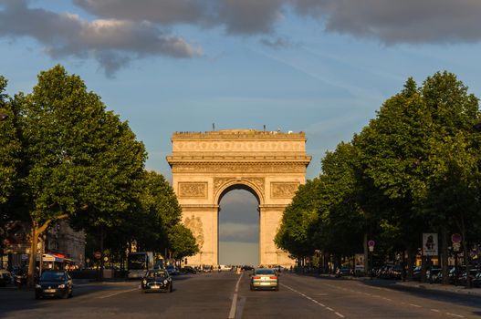 PARIS, FRANCE - CIRCA JUNE 2012: The Arc de Triomphe at sunset as seen from Avenue de la Grande Armée.