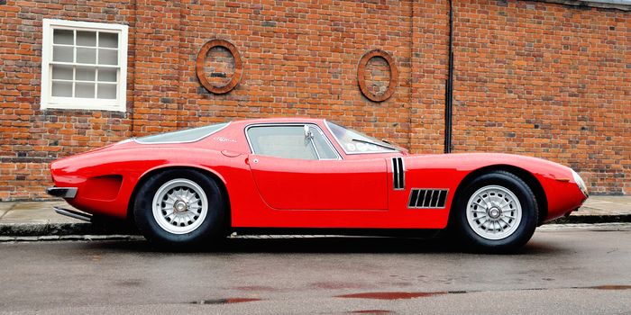 LONDON, UK - CIRCA SEPTEMBER 2011: A Red Bizzarrini 5300 GT Strada at Chelsea Autolegends car show.