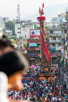 PATAN, NEPAL - 19 APRIL, 2018: The Rato Machindranath chariot surrounded by the crowd at Pulchowk.