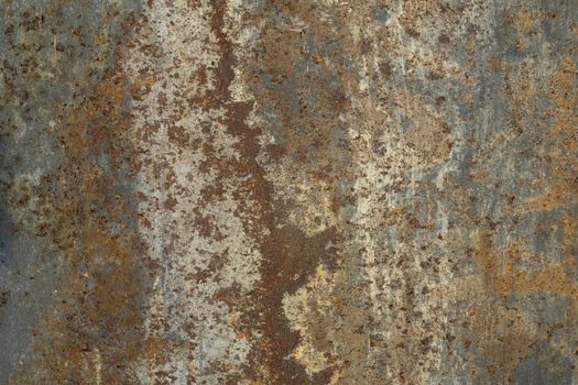 Plate of metal rusty on all background, with old layers of a pai