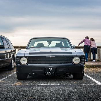 BIARRITZ, FRANCE - CIRCA OCTOBER 2020: A classic Chevrolet coupe muscle car.