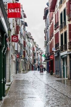 BAYONNE, FRANCE - MARCH 16, 2019: Rue d'Espagne (Spain Street), a usually busy pedestrian street is almost deserted because of the Coronavirus outbreak and the subsequent lockdown.