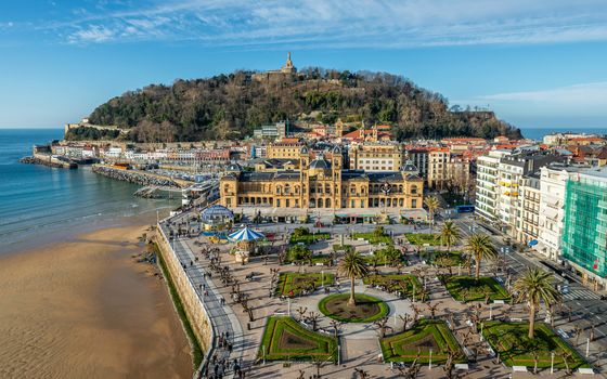 SAN SEBASTIAN, SPAIN - CIRCA JANUARY 2020: Aerial view of the Alderdi-Eder Park, the City Hall and the castle on Urgull hill.