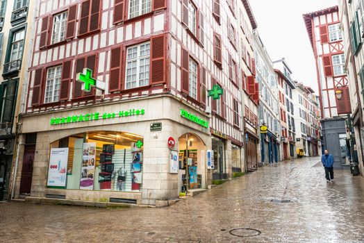 BAYONNE, FRANCE - MARCH 16, 2019: An open pharmacy during France lockdown following the Coronavirus outbreak.