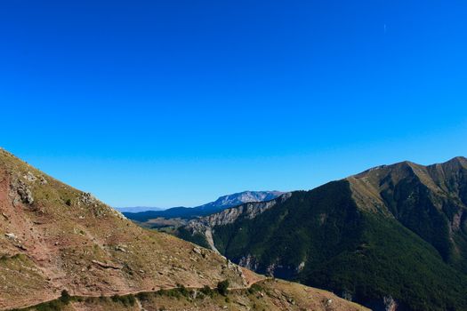 Landscape above the old Bosnian village of Lukomir. Mountain peaks and hills. Bjelasnica Mountain, Bosnia and Herzegovina.