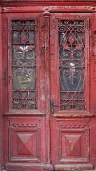 vintage entrance wooden brown door with glass close-up