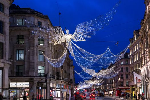 London, England - December 19 2019: London's Regent St festive Christmas street lights and decorations