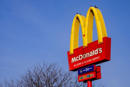 Arnprior, Ontario, Canada - November 6, 2020: A McDonald's 'golden arches' restaurant sign at a 24-hour restaurant location.