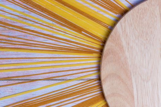 .Spaghetti from buckwheat and wheat flour on a wooden table.