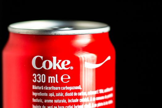 Editorial photo of classic Coca-Cola can on black background. Studio shot in Bucharest, Romania, 2020