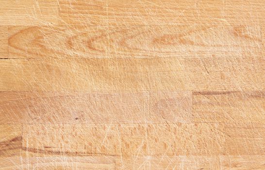 Old wooden cutting board background texture, intensively used