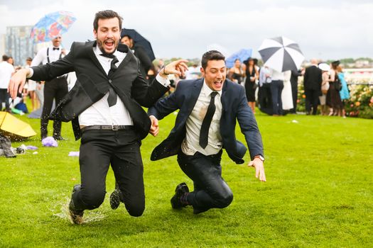 MELBOURNE, AUSTRALIA - NOVEMBER 2: Drunk punters at the end of Derby Day at the 2019 Melbourne Cup Carnival at Flemington Racecourse in Melbourne Australia