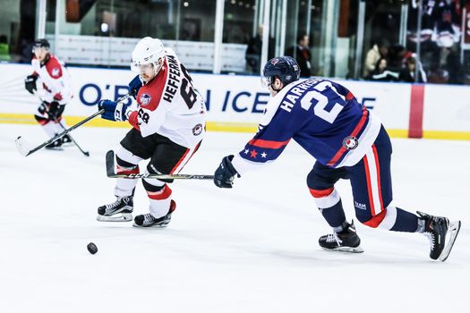 MELBOURNE, AUSTRALIA - JUNE 21: Shane Heffernan of Canada up against Tim Harrison of USA in the 2019 Ice Hockey Classic in Melbourne, Australia