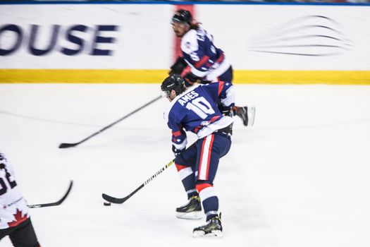 MELBOURNE, AUSTRALIA - JUNE 21: Preston Ames of USA skates with the puck in the 2019 Ice Hockey Classic in Melbourne, Australia