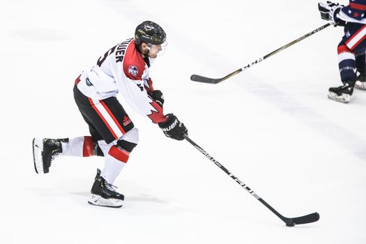 MELBOURNE, AUSTRALIA - JUNE 21: James Bettauer of Canada skates in the 2019 Ice Hockey Classic in Melbourne, Australia