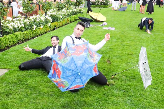 MELBOURNE, AUSTRALIA - NOVEMBER 2: Drunk punters at the end of Derby Day at the 2019 Melbourne Cup Carnival at Flemington Racecourse in Melbourne Australia