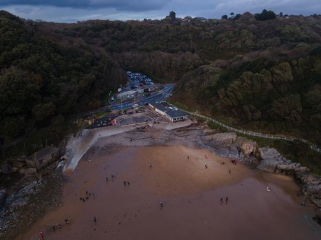 An Ariel View Of Caswell Bay Beach, Gower, Wales, UK At Night In Winter. A popular coastal destination in the cold months.