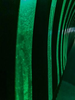 Abstract lighting wall with green stripes