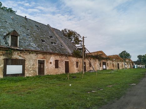 Old ruined barracks in small old village